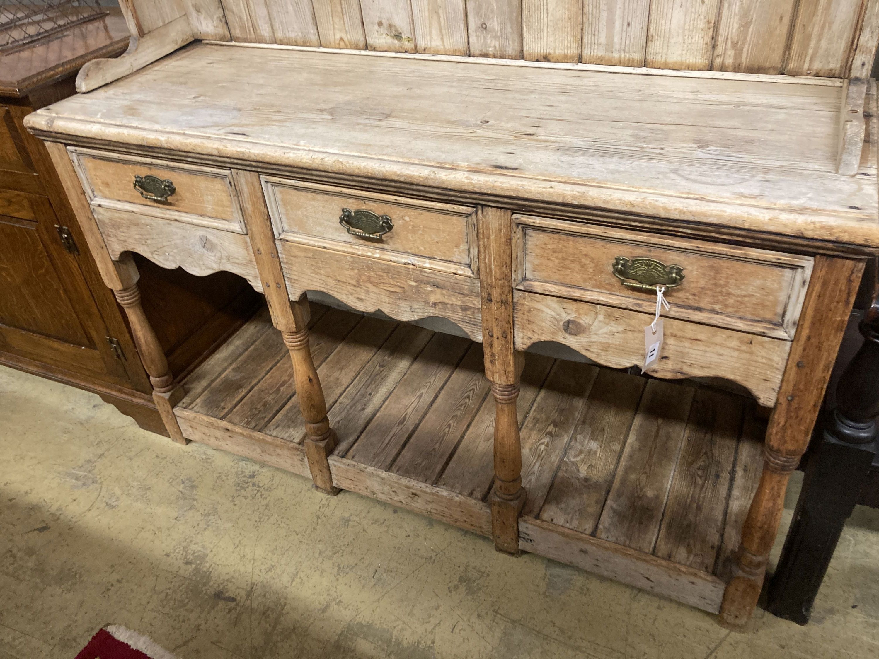 A 19th century pine potboard dresser, length 130cm, depth 47cm, height 190cm